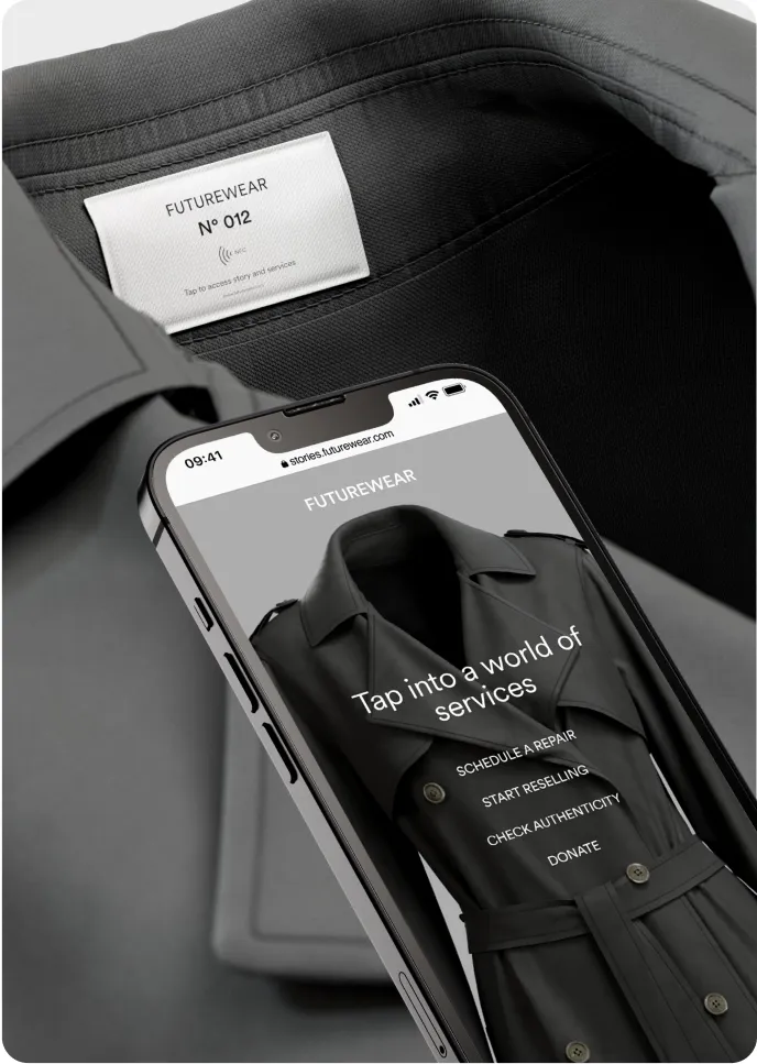 A phone tapping an NFC chip on a trench coat to access embedded services such as resale